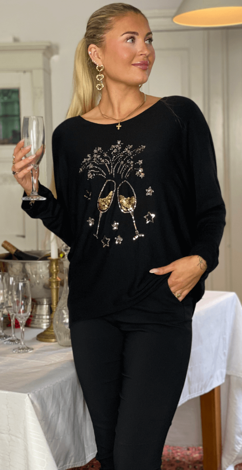 Madelene strikbluse med champagneglas i pailletter sort Likelondon