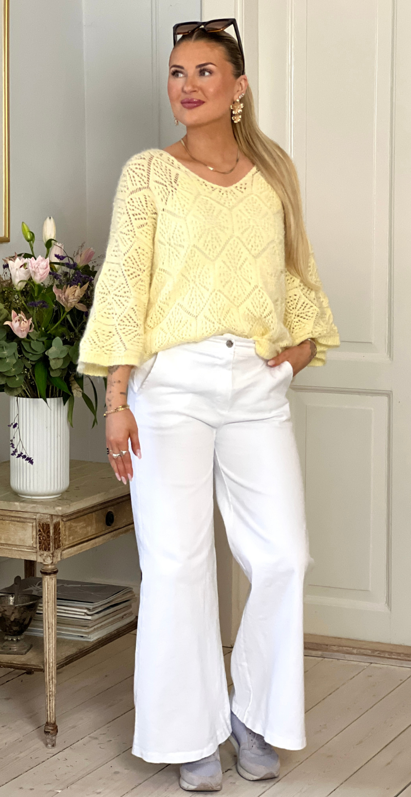 Gamma strikbluse med hulmønster gul LikeLondon