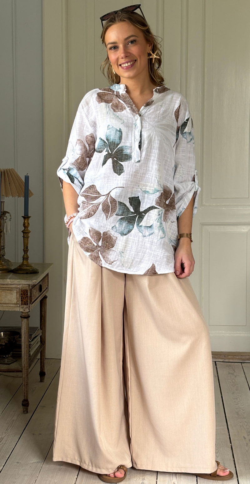 Bessie bluse med bladmotiv og stolpelukning bianco/hvid LikeLondon