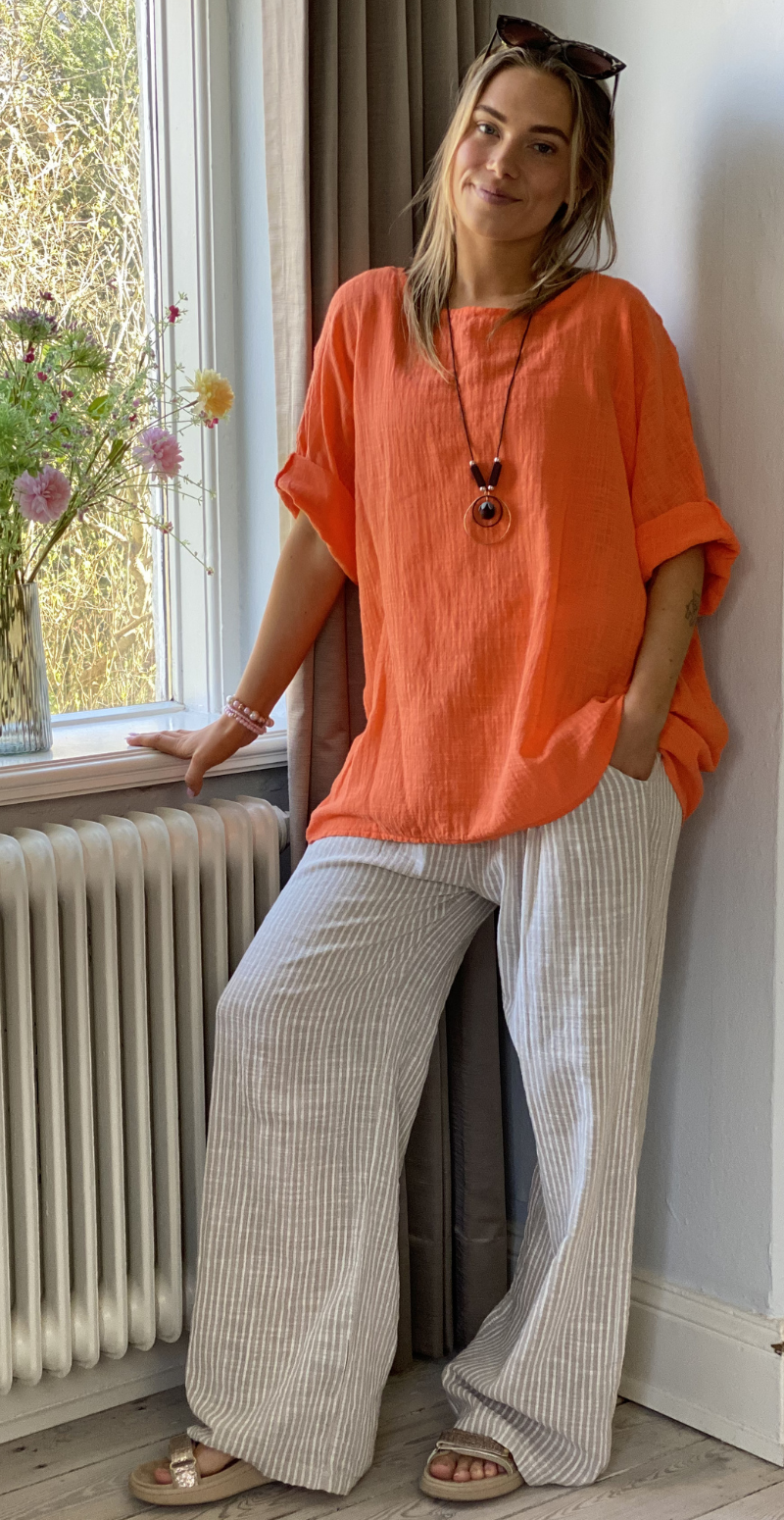 Alida bluse med vidde og halskæde orange LikeLondon