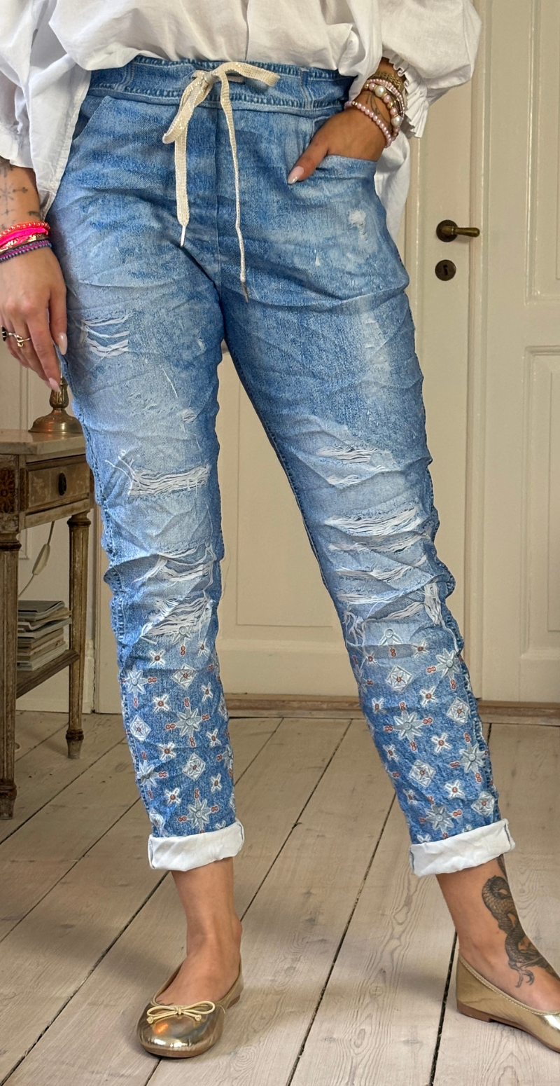 Sisse bukser med orange paillet mønster Likelondon