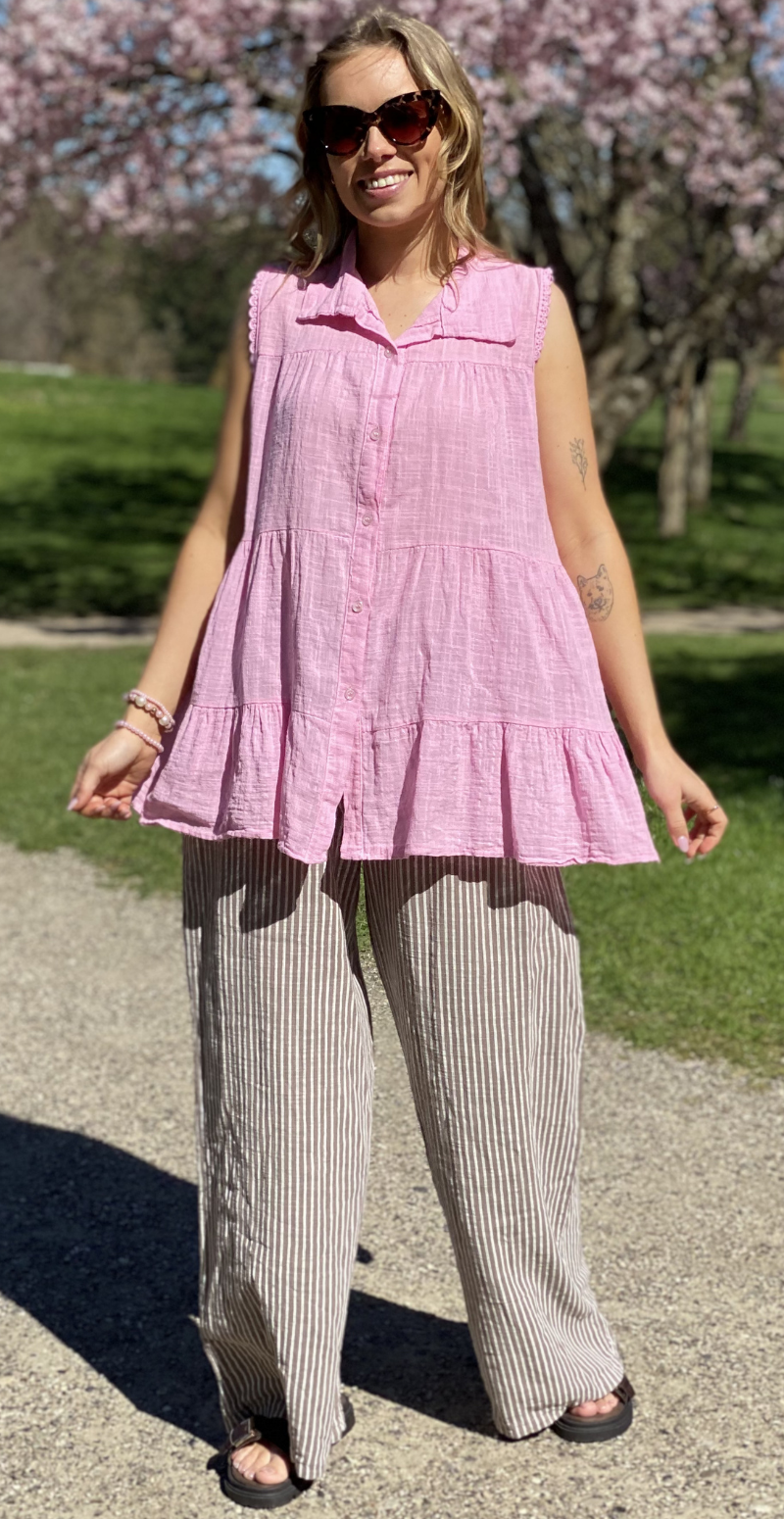 Rinda bluse uden ærmer med peplum og hæklede detaljer pink LikeLondon