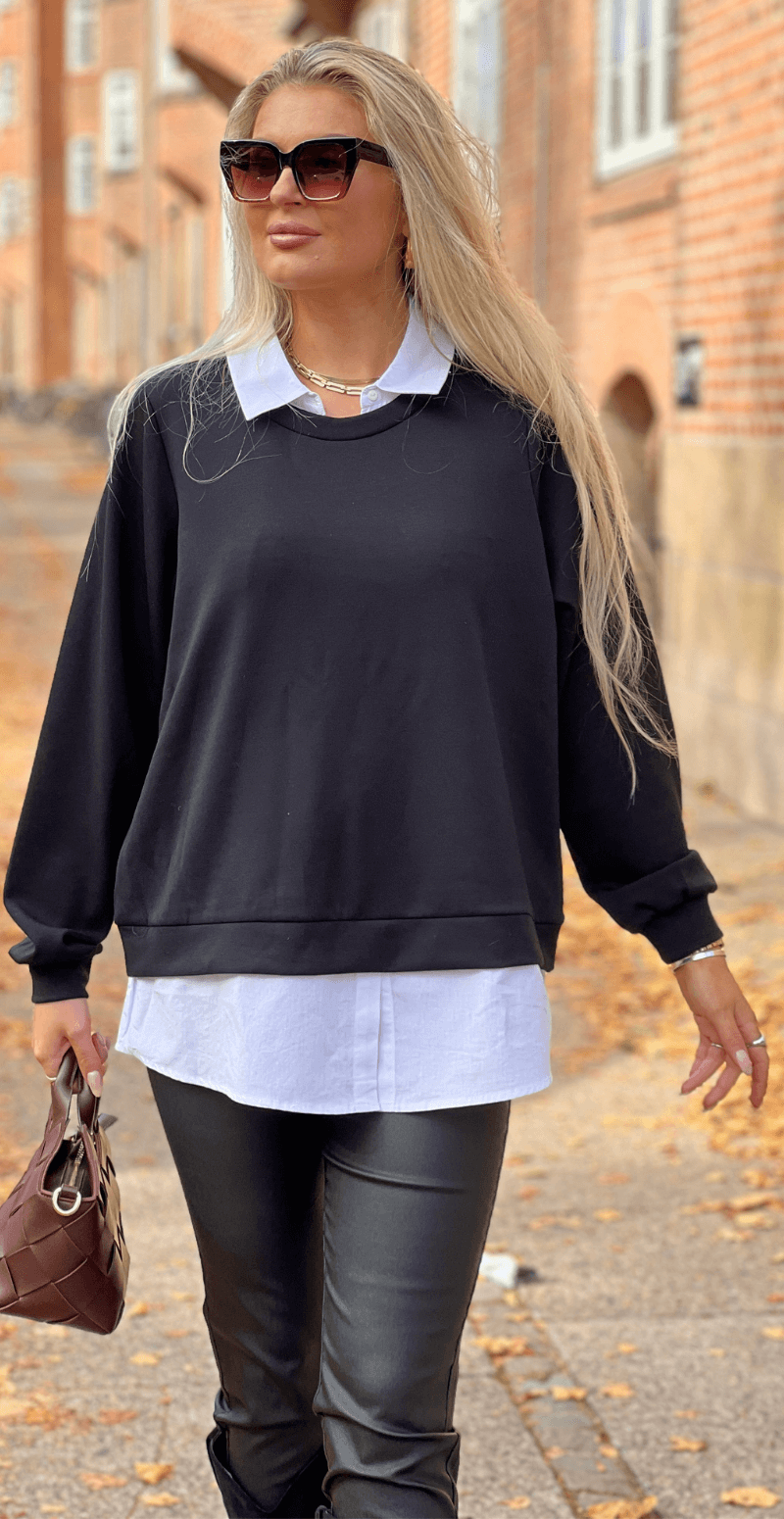 Julia bluse med ensfarvet skjortekant sort