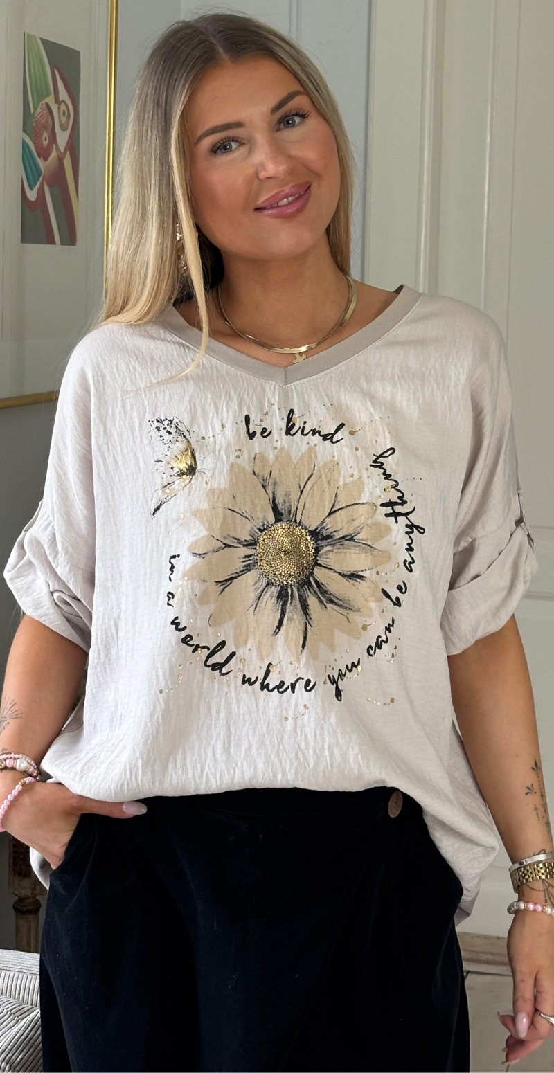 Isola bluse med korte ærmer og marguerit blomst beige LikeLondon