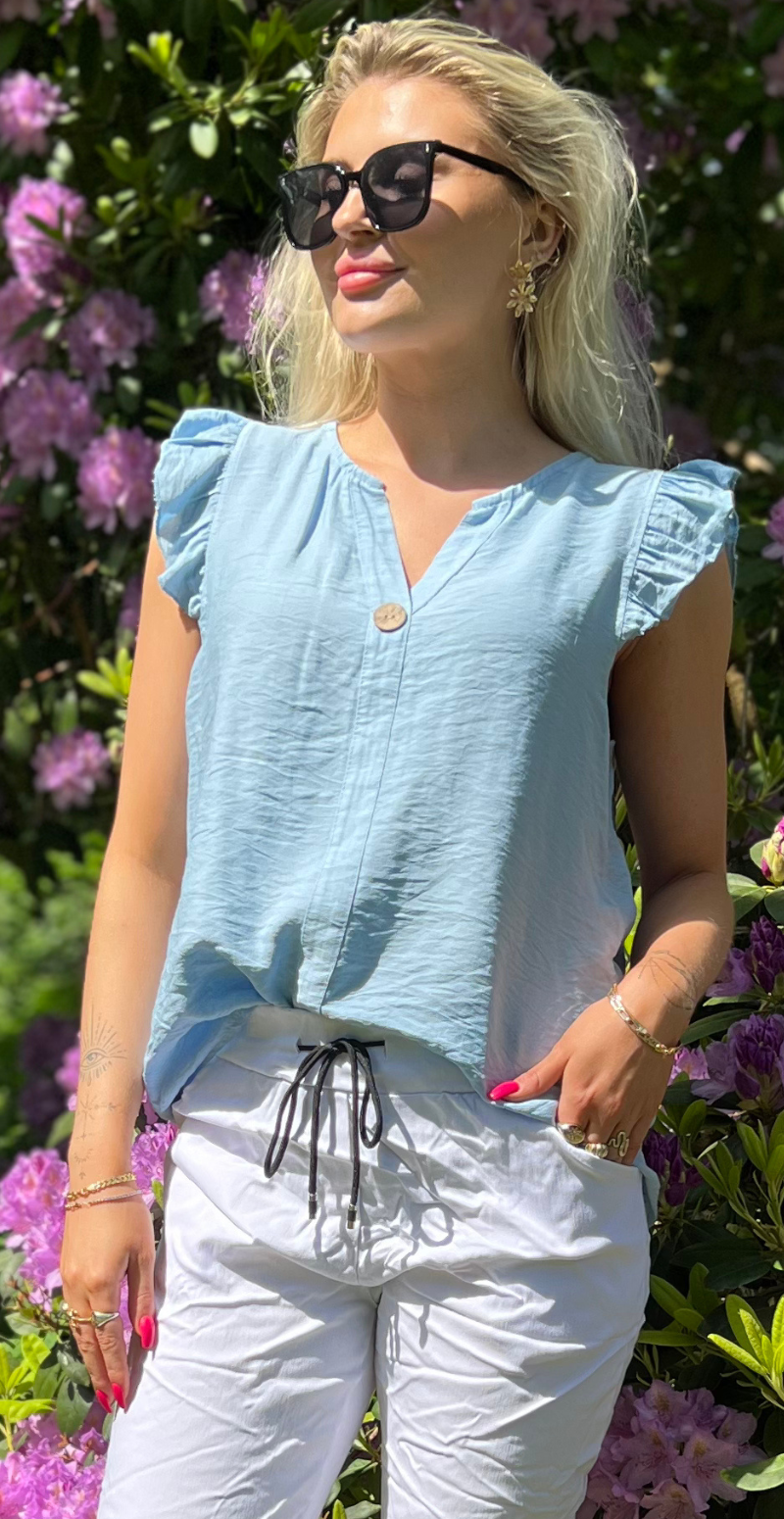 Lotus bluse med flæse detaljer lysblå LikeLondon