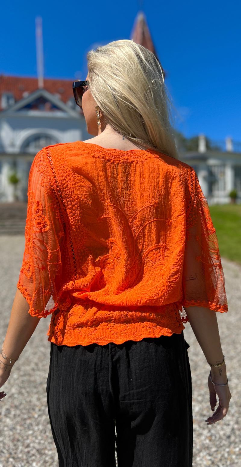 Lexi bluse med elastik i taljen og blonde orange LikeLondon