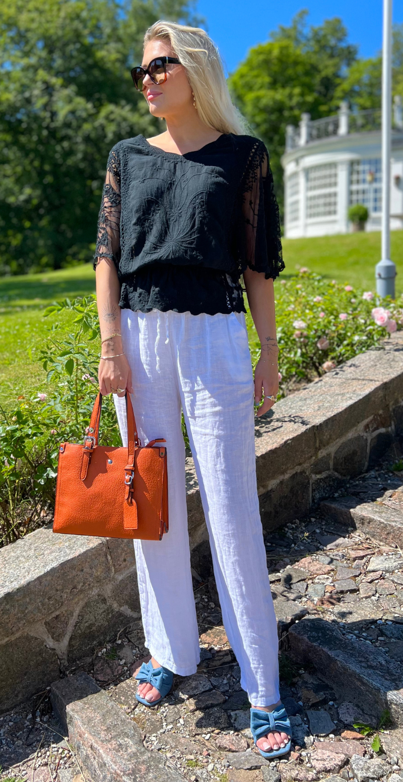 Lexi bluse med i taljen og flagermusærmer sort LikeLondon