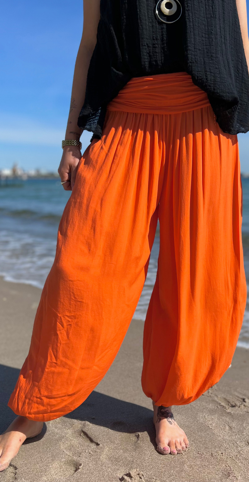 Jill buks med elastik ved talje og fod orange Likelondon