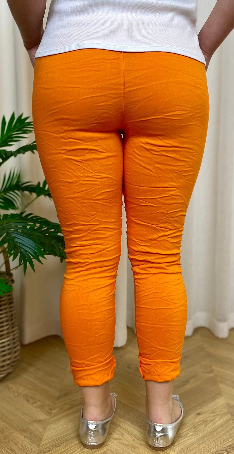 Orange Nora bukser bagfra