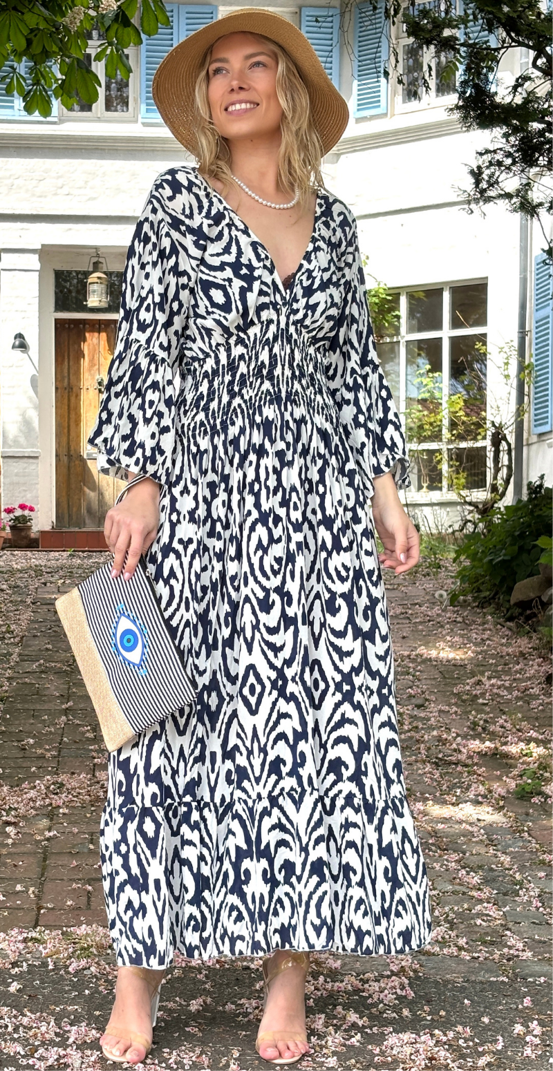 Felicia kjole med abstrakt mønster og smock i taljen navy LikeLondon