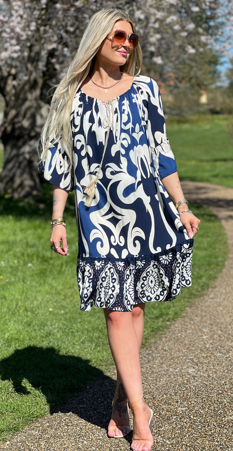 Mira kort kjole med mønster og peplum kanter blå LikeLondon