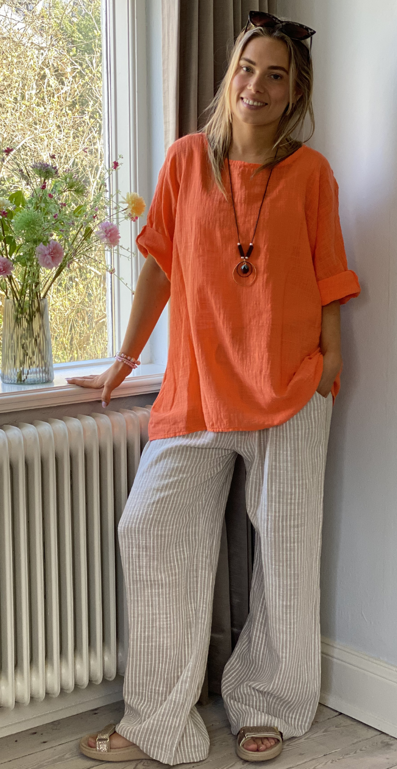 Alida bluse med vidde og halskæde orange LikeLondon