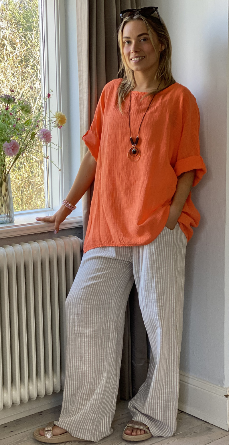 Alida bluse med vidde og halskæde orange LikeLondon