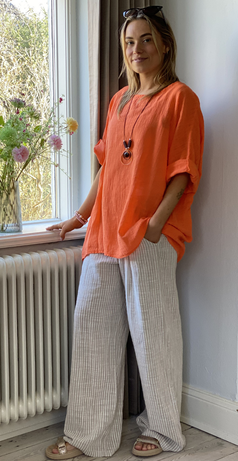 Alida bluse med vidde og halskæde orange LikeLondon