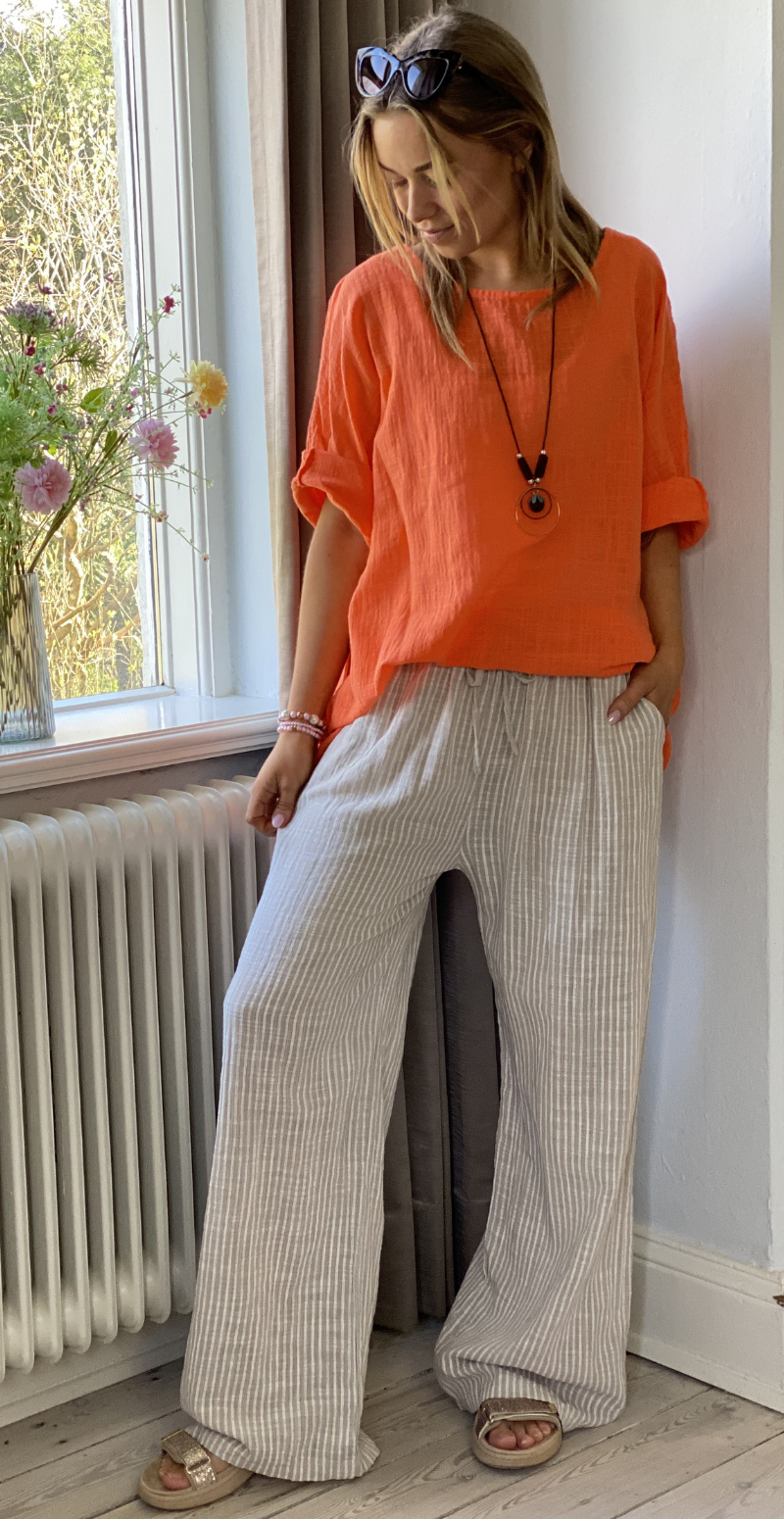 Alida bluse med vidde og halskæde orange LikeLondon
