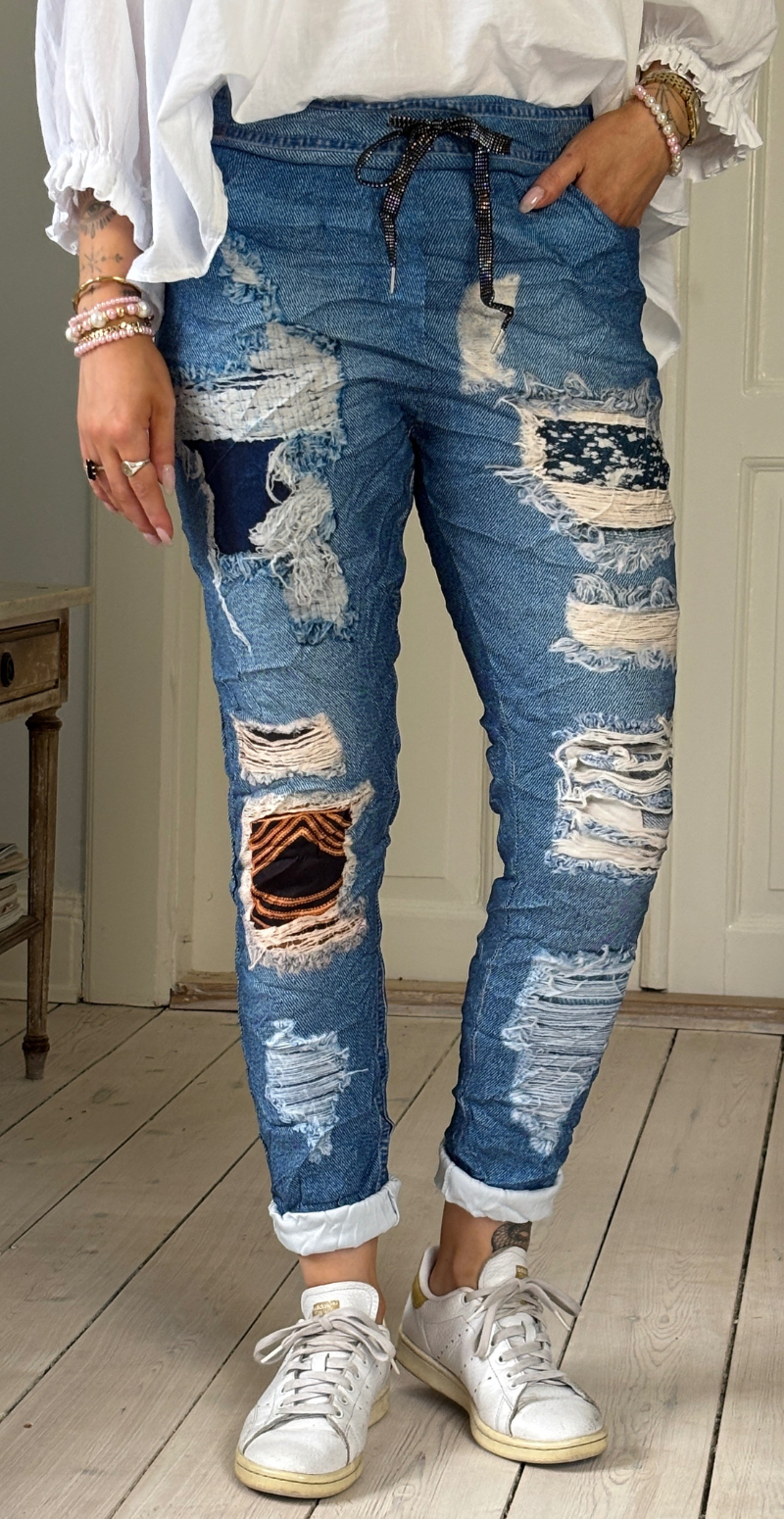 Sisse bukser i råt denimlook med stjerner LikeLondon