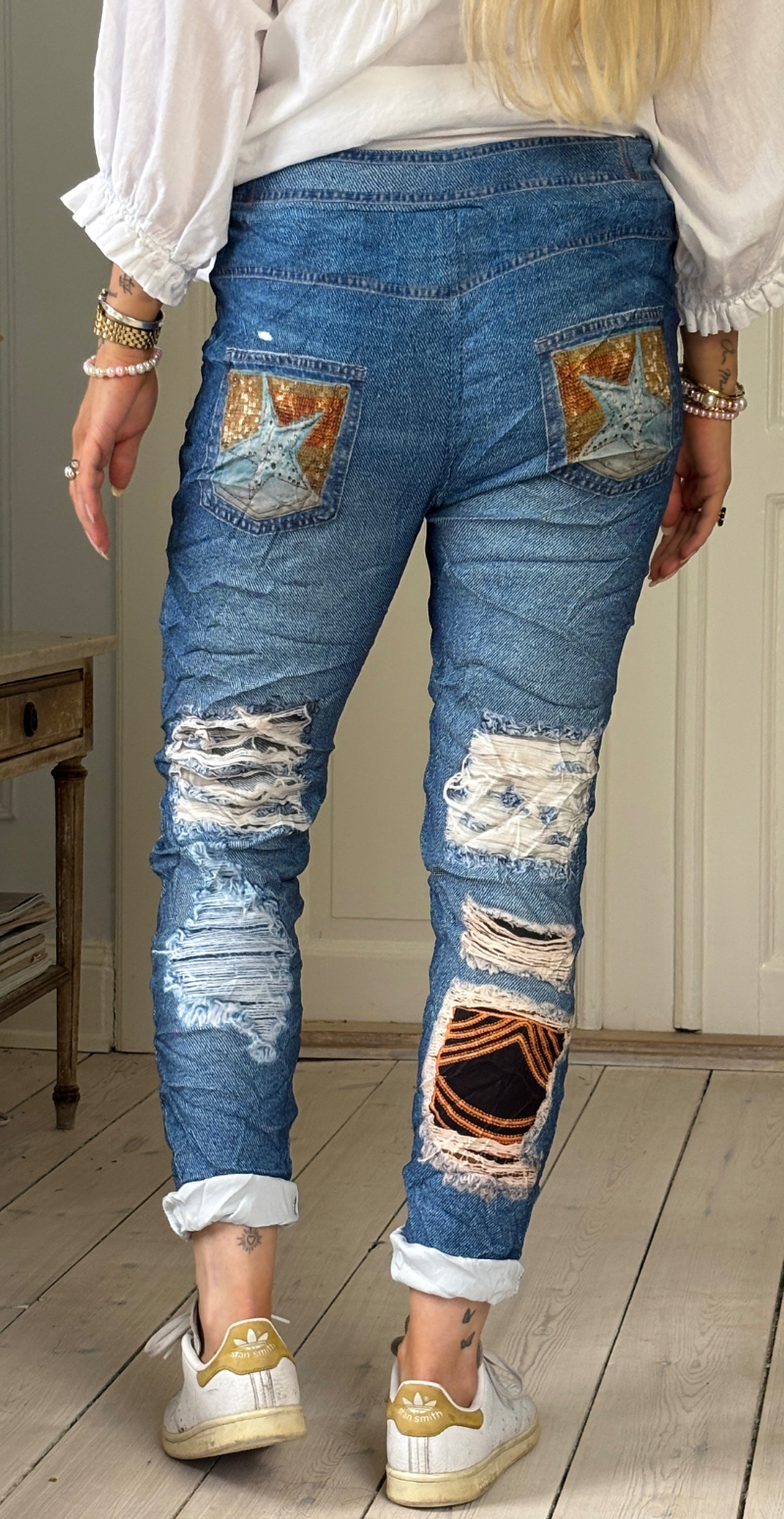 Sisse bukser i råt denimlook med stjerner LikeLondon
