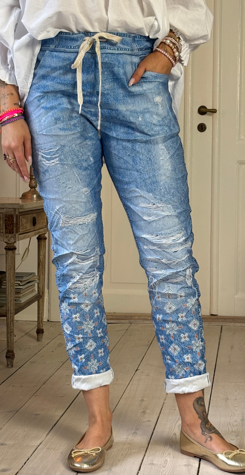 Sisse bukser med orange paillet mønster Likelondon