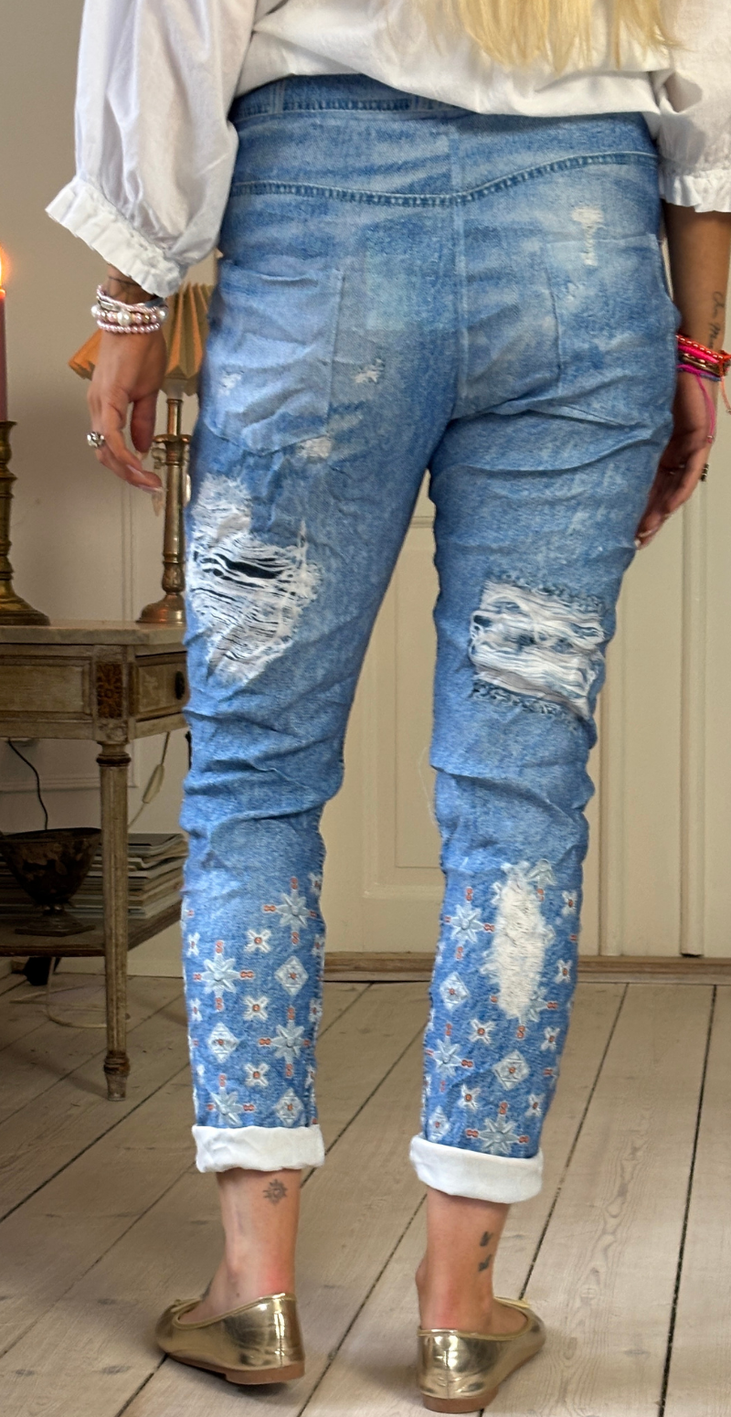 Sisse bukser med orange paillet mønster Likelondon