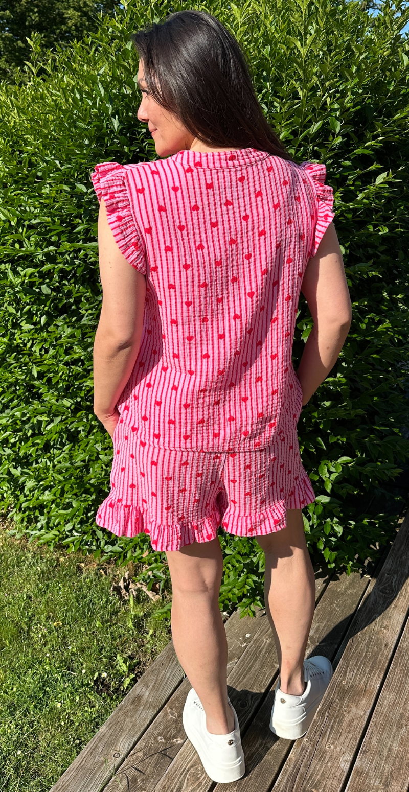 Cheri bluse med hjerter og flæseærmer pink LikeLondon by Christina