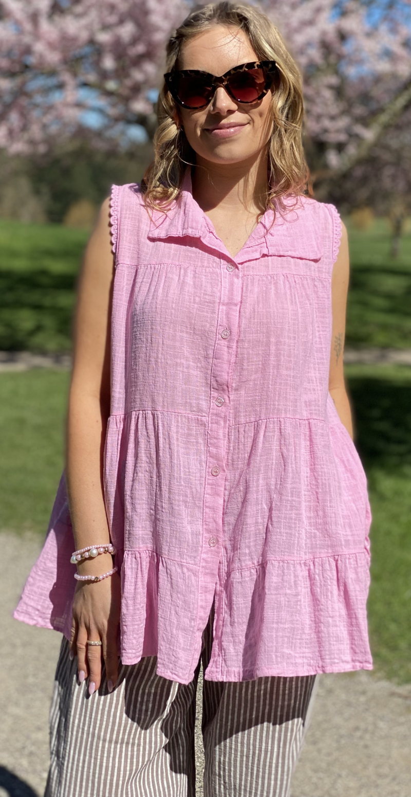 Rinda bluse uden ærmer med peplum og hæklede detaljer pink LikeLondon