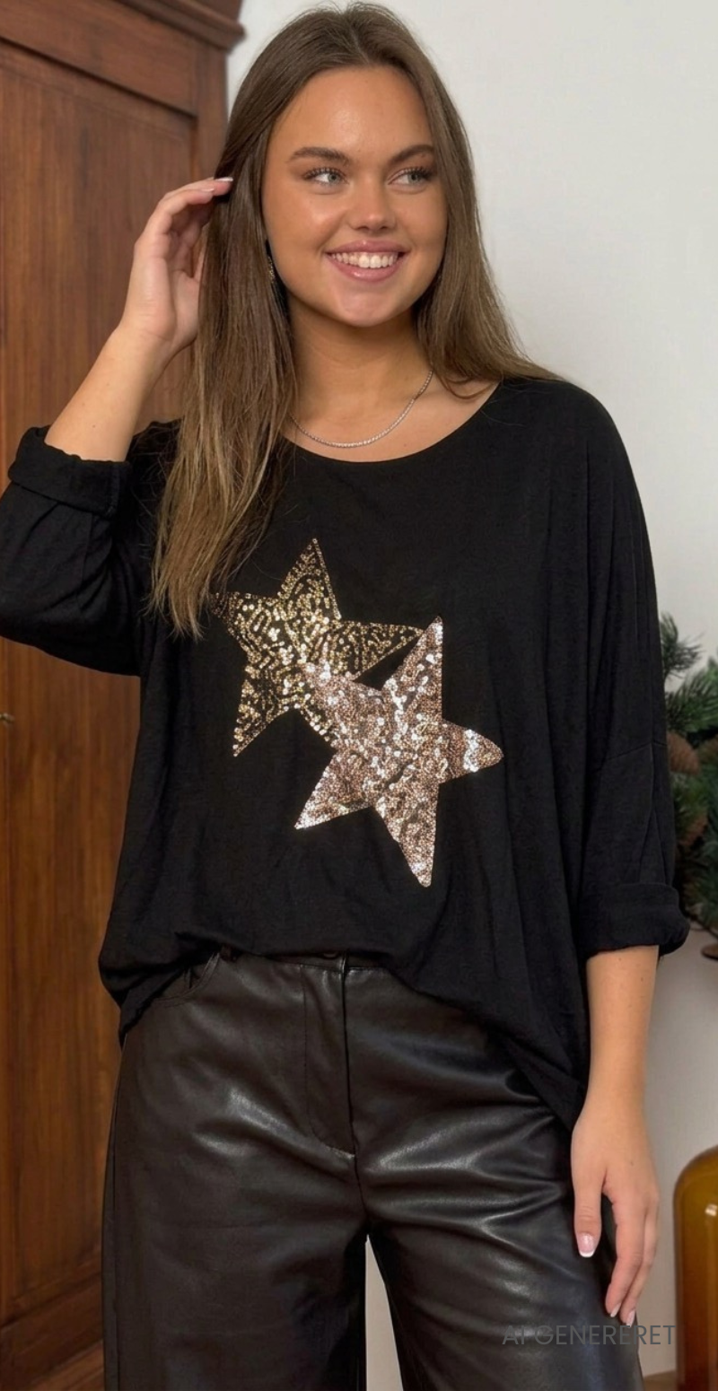 Madelene strikbluse med store stjerner i pailletter sort LikeLondon