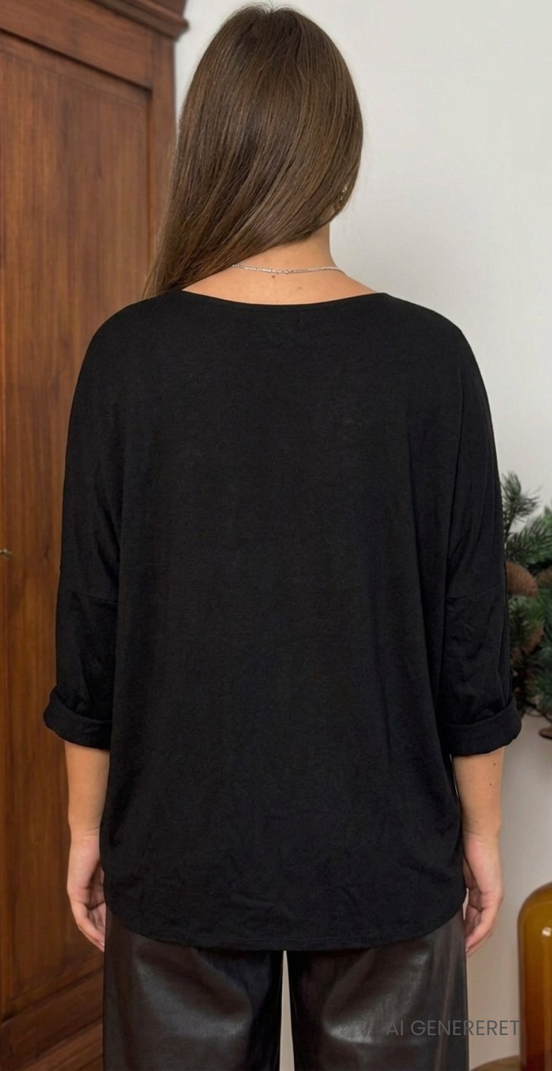 Madelene strikbluse med store stjerner i pailletter sort LikeLondon