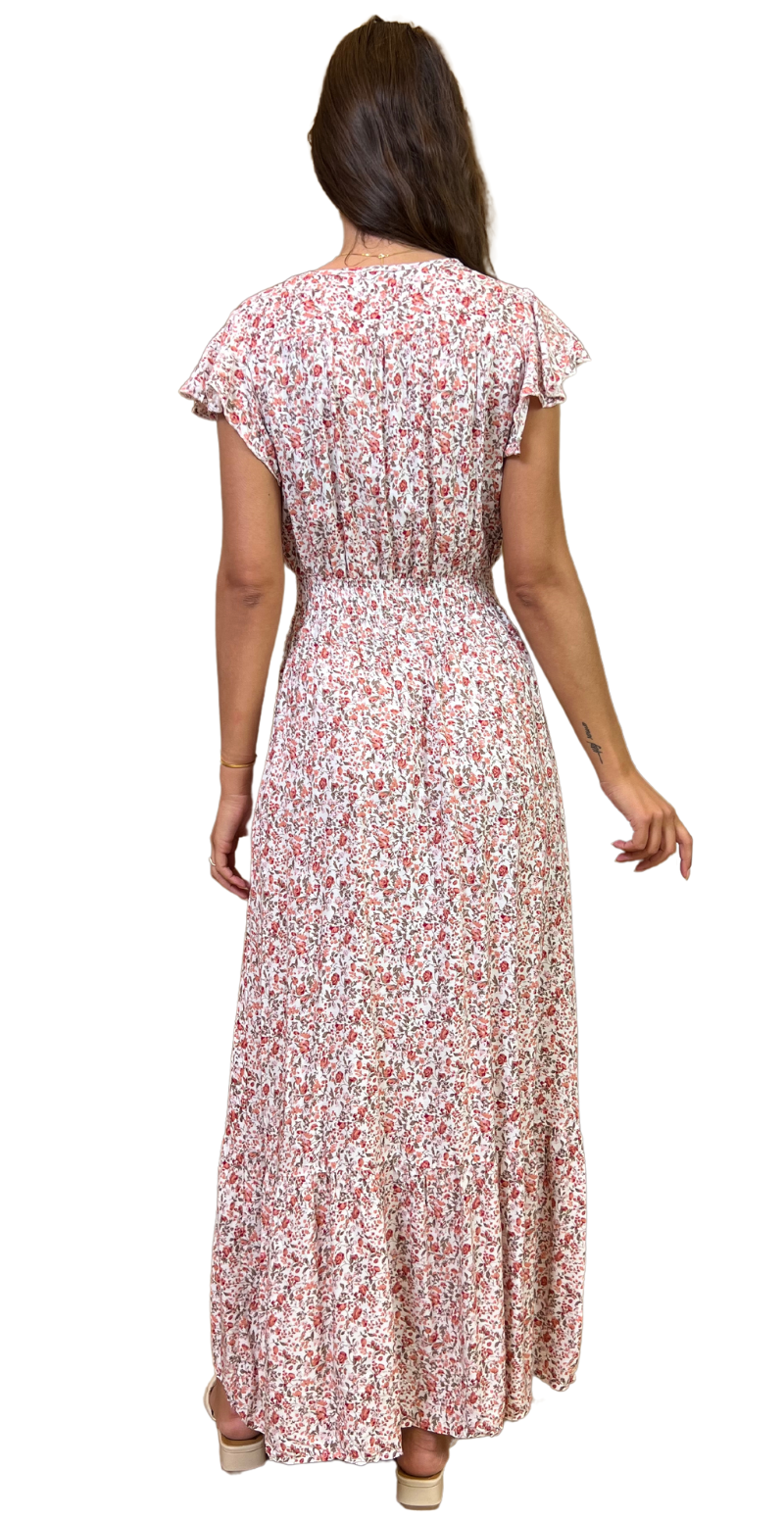 Lang kjole med rosenprint og v-hals hvid og rosa bagfra