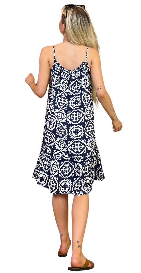Kort Poppy kjole med tynde stropper og print navy bagfra