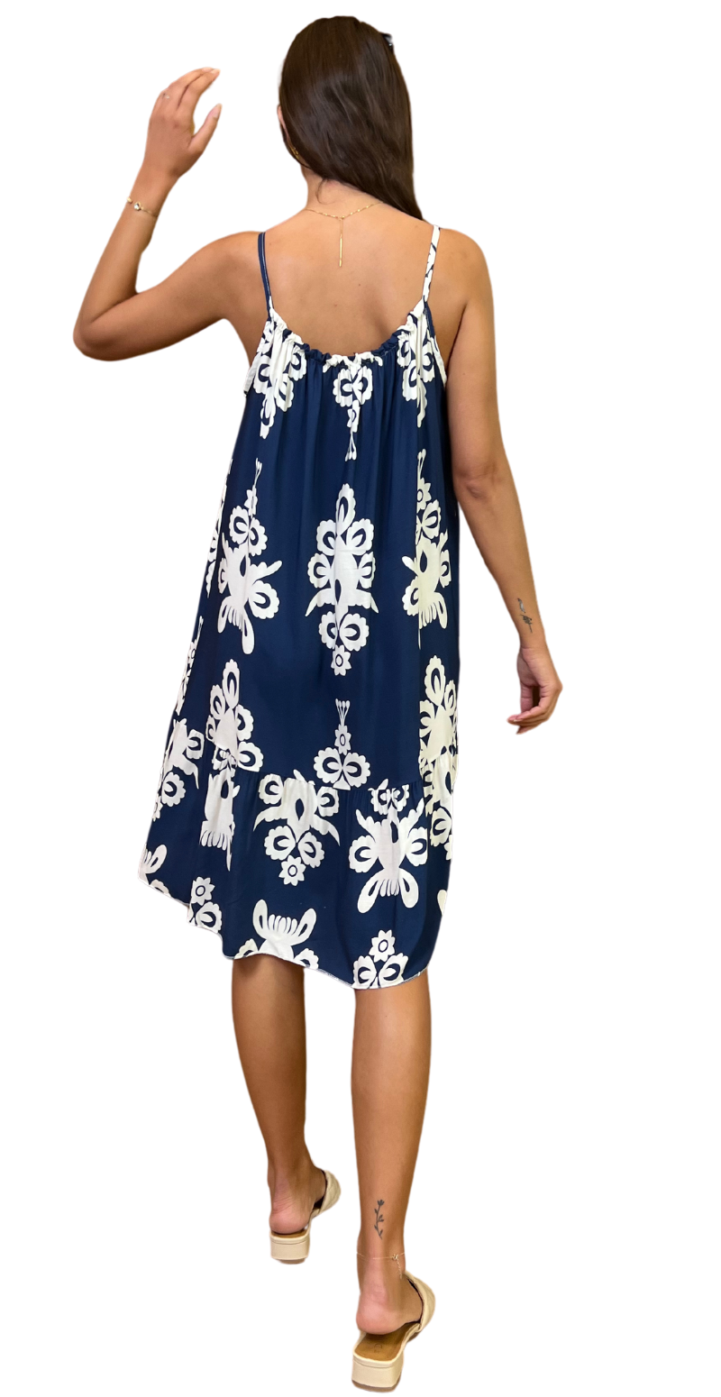 Kort Poppy kjole med tynde stropper og blomstermønster navy bagfra
