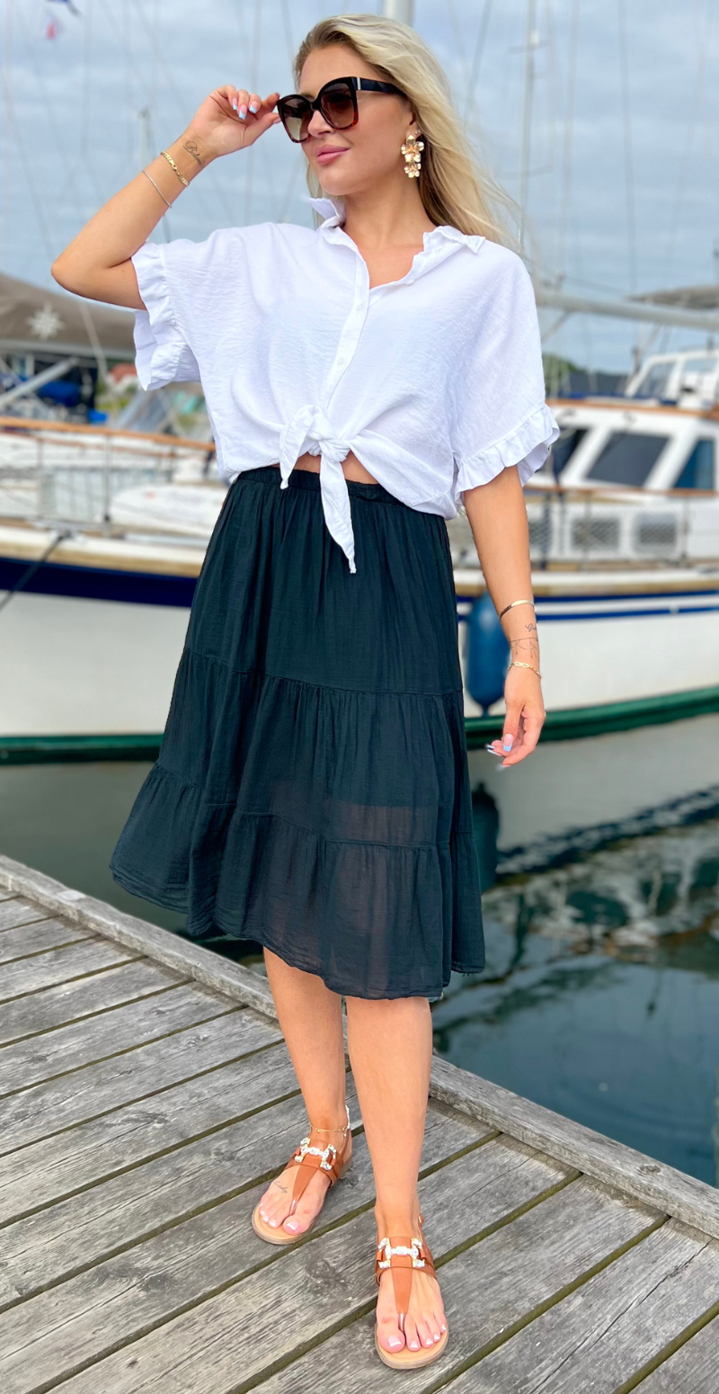 Kort Gigi nederdel med peplum og elastik i taljen sort