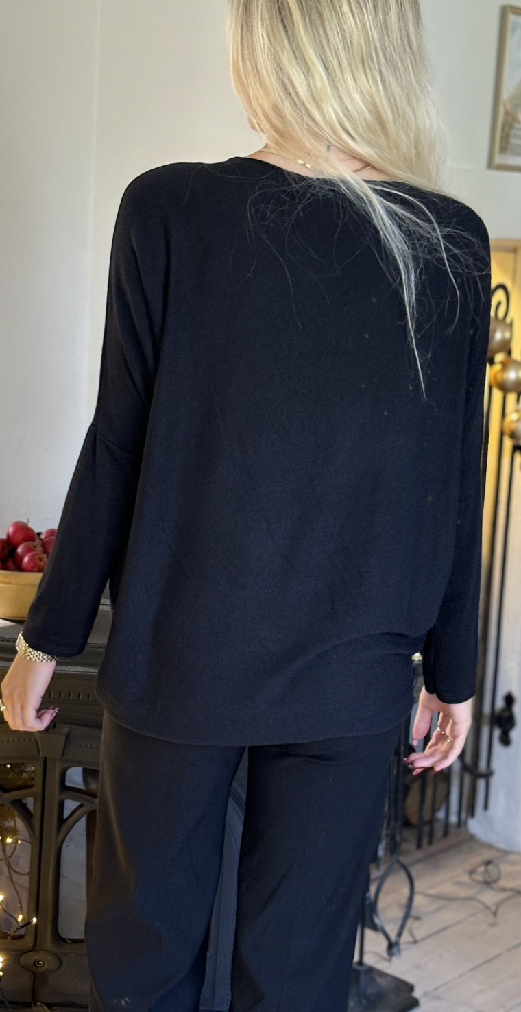 Madelene strikbluse med paillet stjerne sort Likelondon