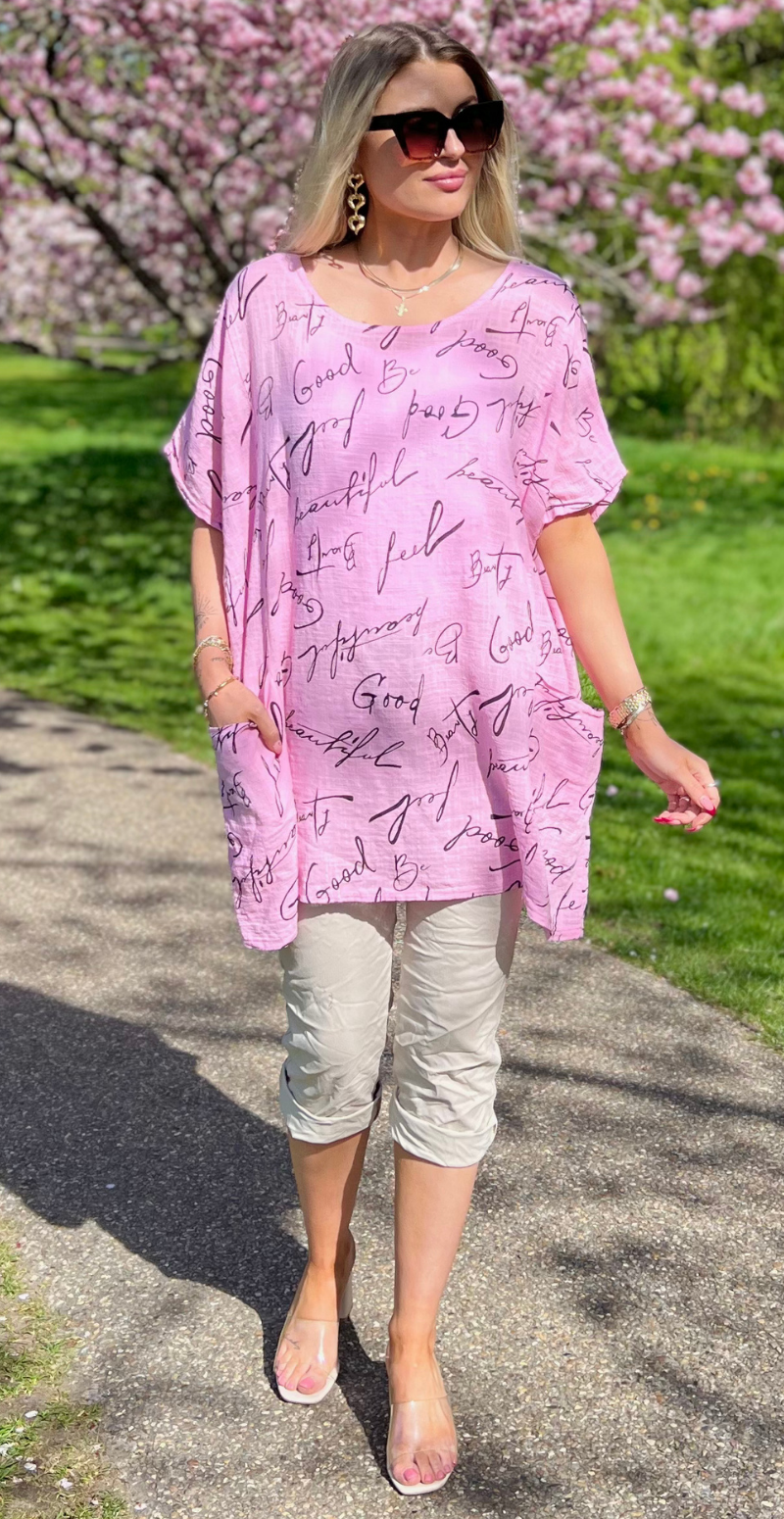 Dicte bluse med vidde, lommer og skrift pink LikeLondon