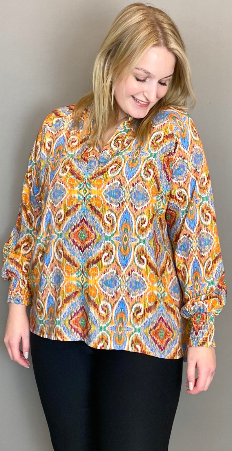 Bluse med smock ved ærmet arancio