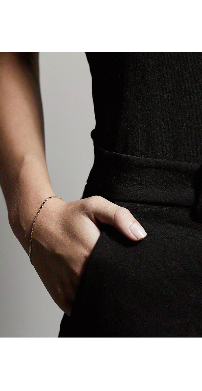 Guld armbånd med flade led